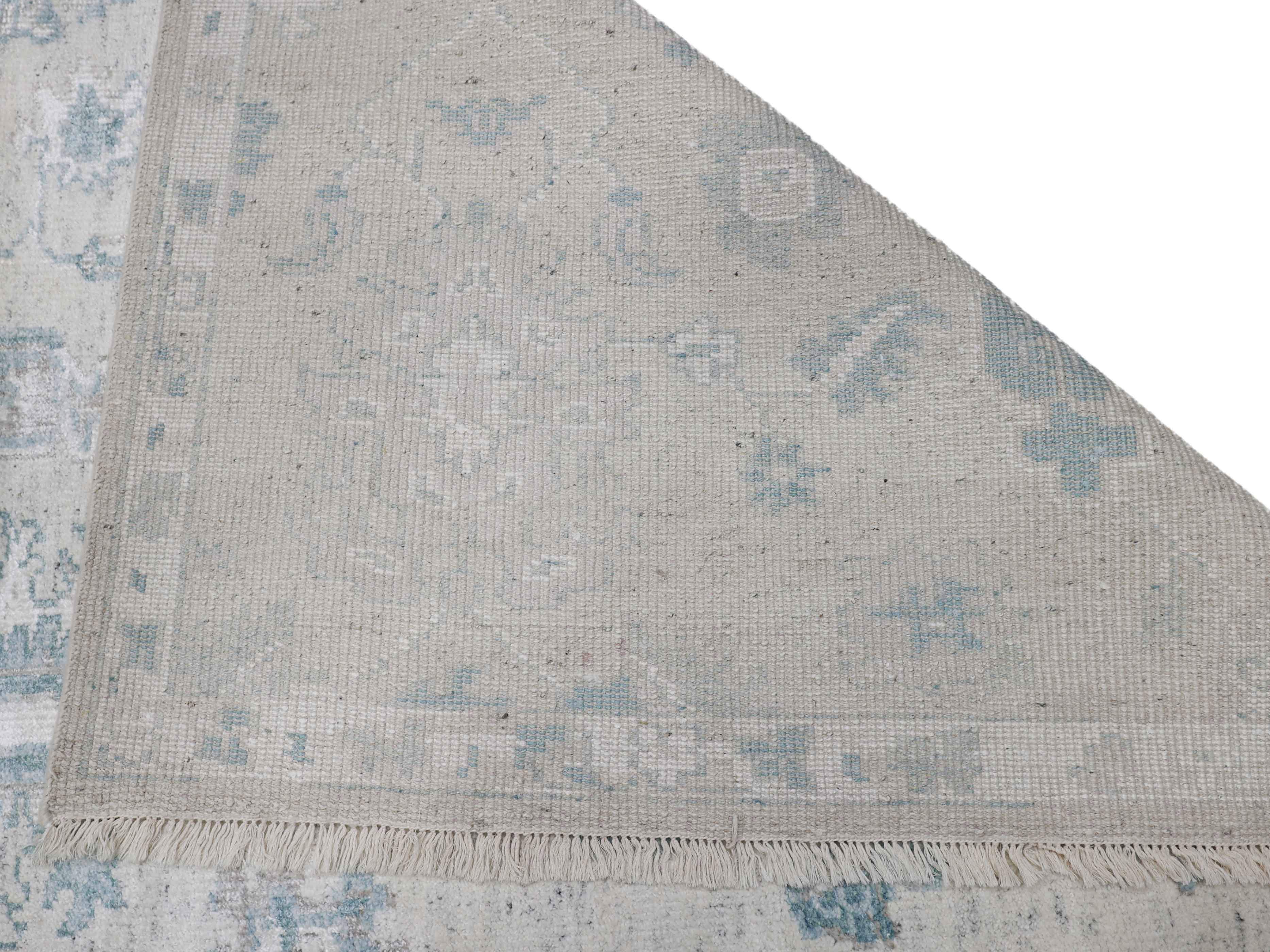 NEELAYA | 8' x 10' FT | TRADITIONAL RUGS | IVORY/LT. BLUE COLOR
