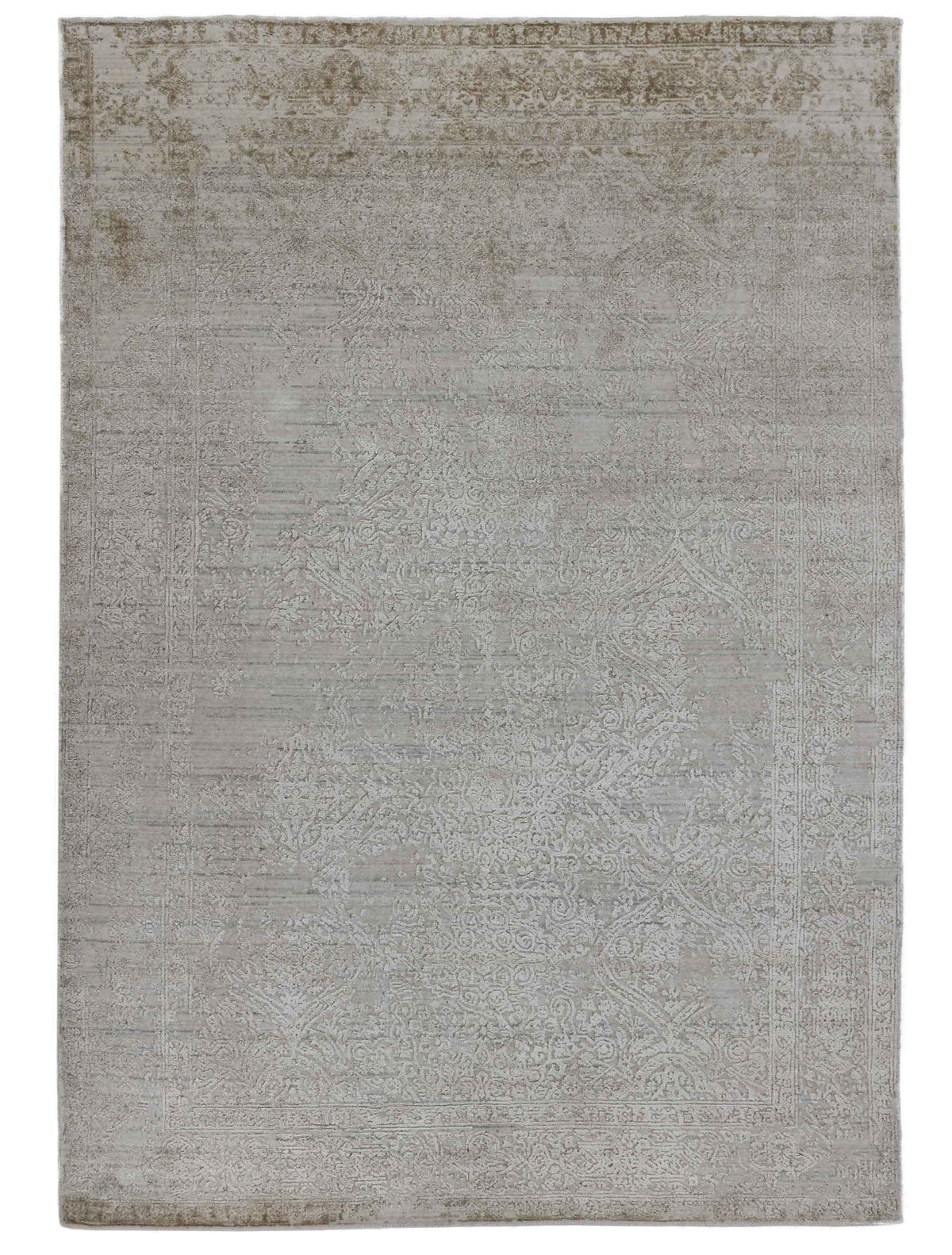 Handmade grey area rug with subtle traditional floral patterns and a distressed finish