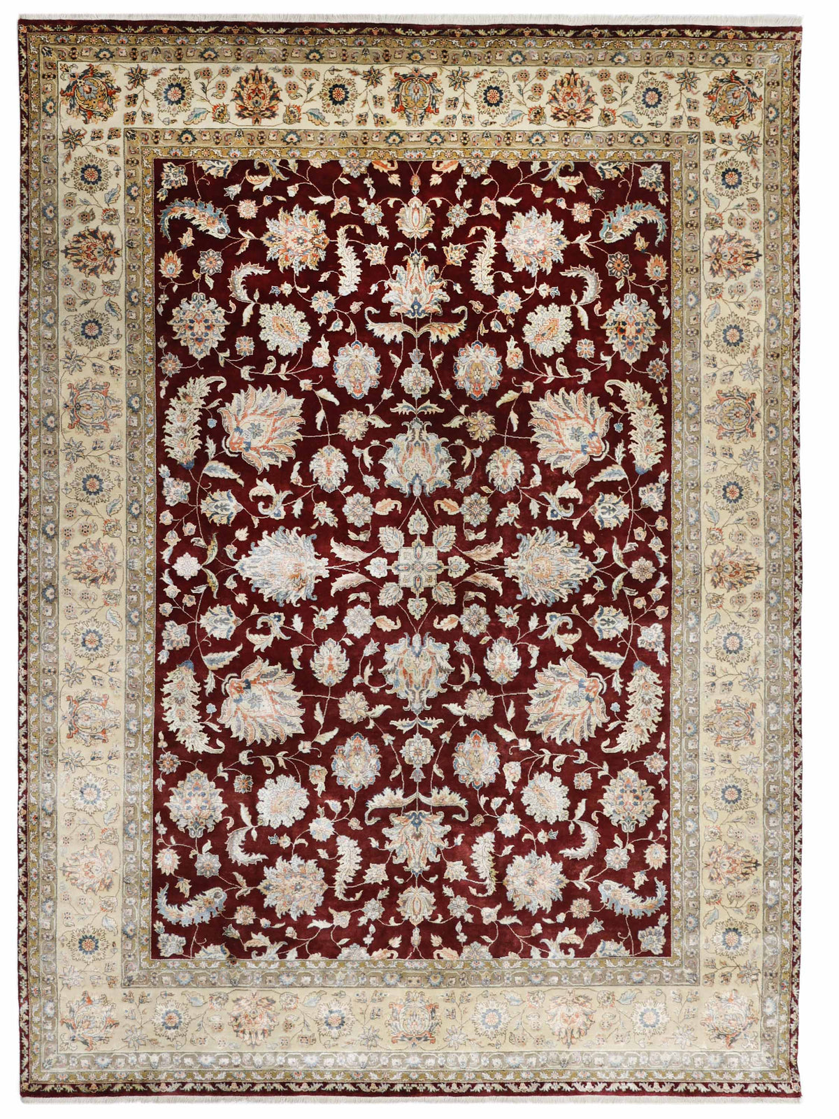 Ornate Persian rug with a rich red background, adorned with intricate floral patterns in cream and blue, enclosed by a detailed beige border.