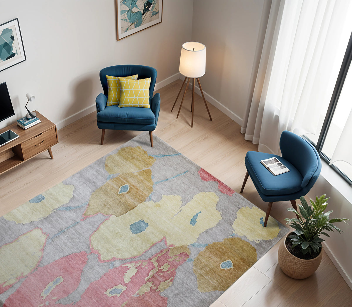 Modern living room with blue armchairs and a colorful abstract handmade rug.